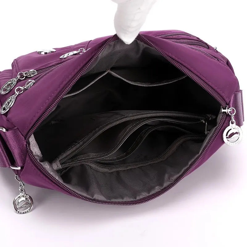 Bag Women's Large Capacity Shoulder Bag Waterproof and Wear Resistant Multi Pocket Commuter Leisure Outdoor Crossbody Bag