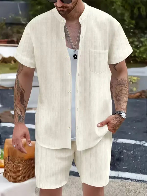 Spring/summer solid color Henry collar pocket suit for men. Shirt casual short sleeve shorts beach loose fashion suit