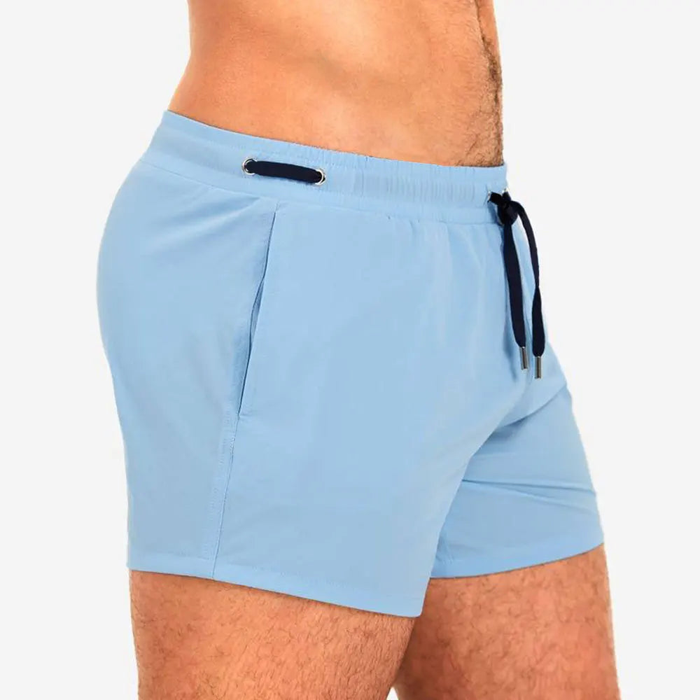 Men's Tight Short Swimwear Swim Trunks Quick Dry Solid Board Shorts Beach Pants Bathing Suits With Pockets and Mesh Lining