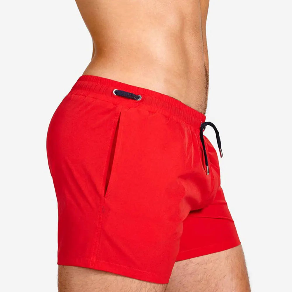Men's Tight Short Swimwear Swim Trunks Quick Dry Solid Board Shorts Beach Pants Bathing Suits With Pockets and Mesh Lining